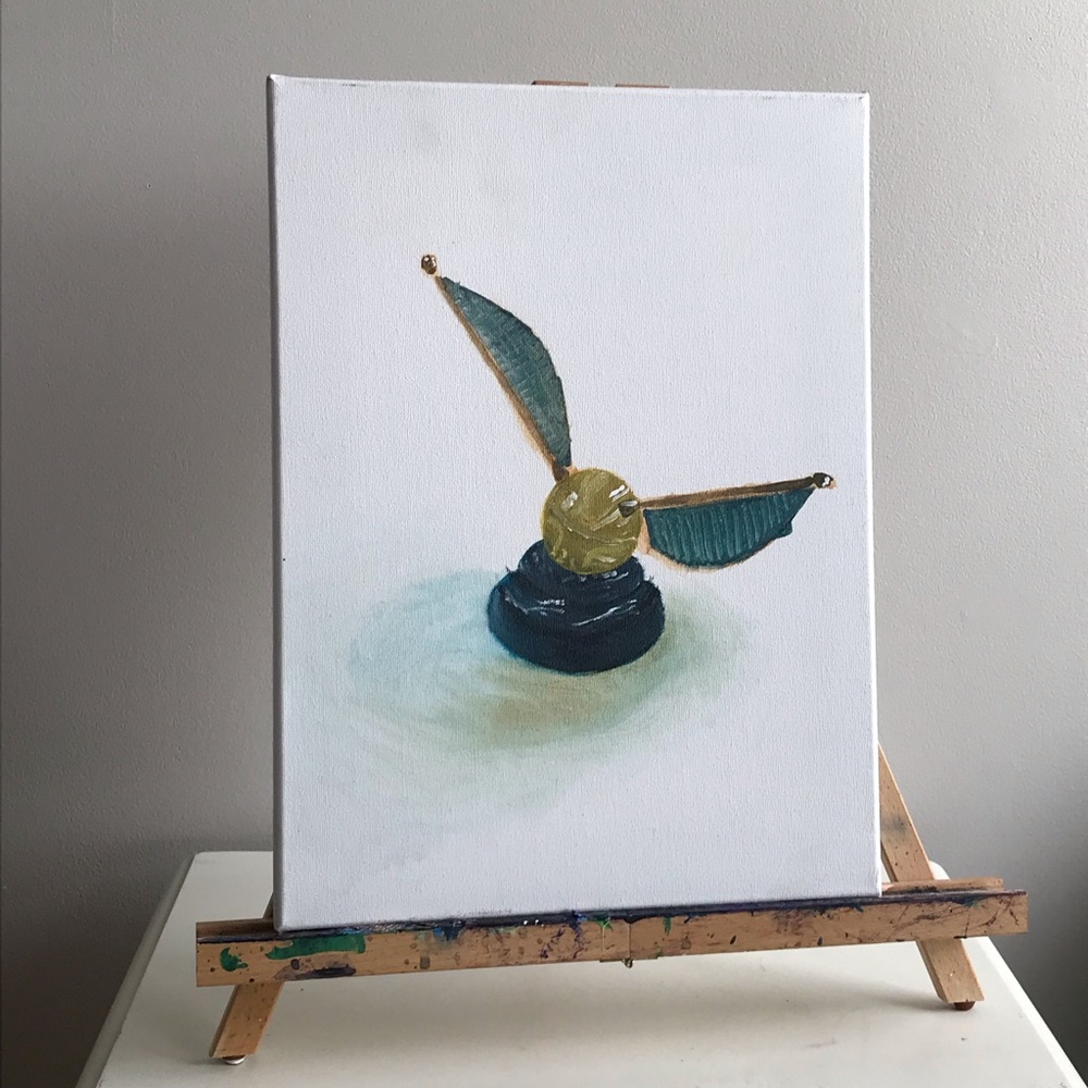 Original painting of Golden Snitch toy.